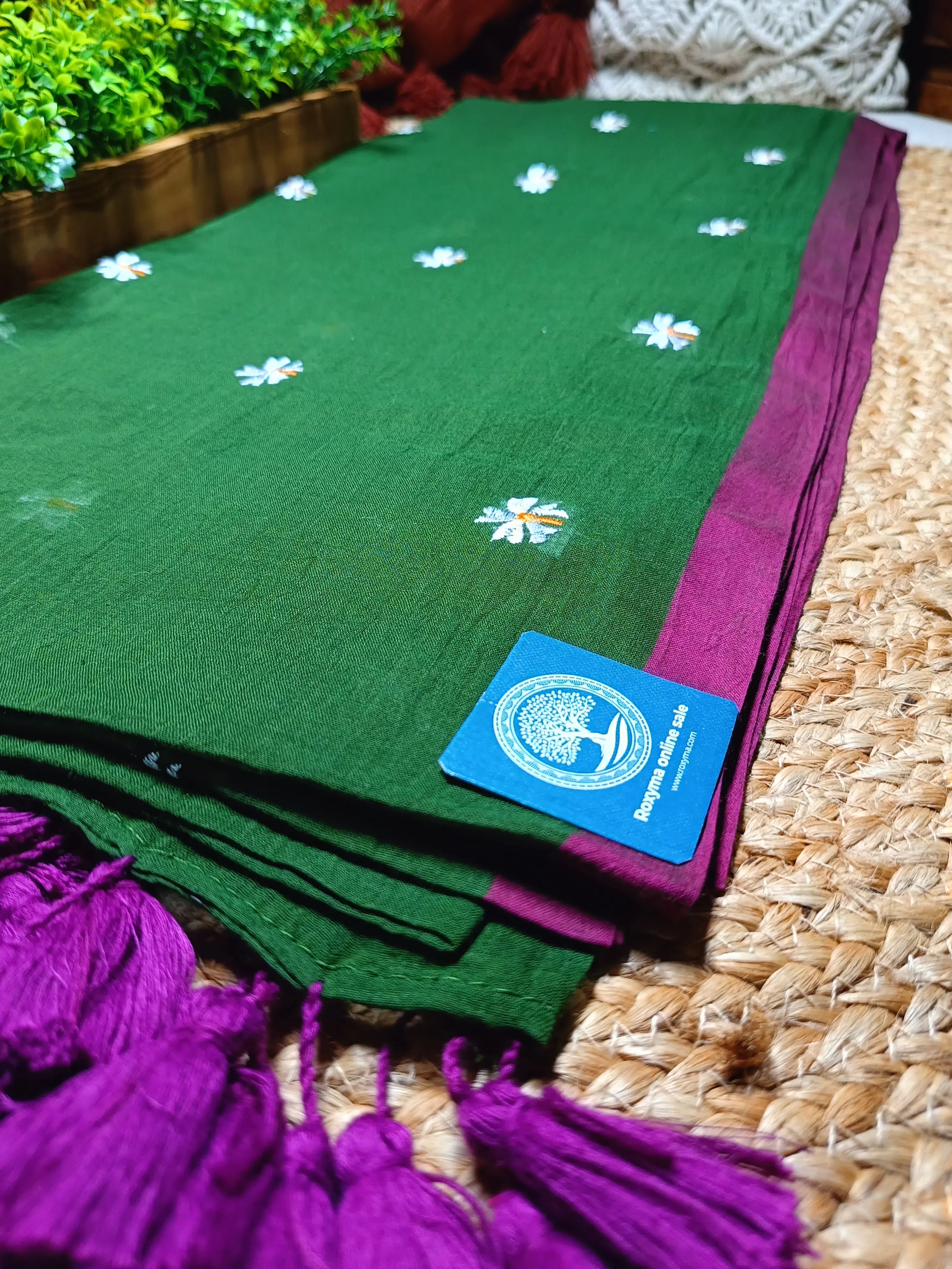 Pure Mulmul Cotton Saree with Seuli Flower Embroidery – Handcrafted Lightweight Bengal Cotton Saree in Forest Green with Contrast Border