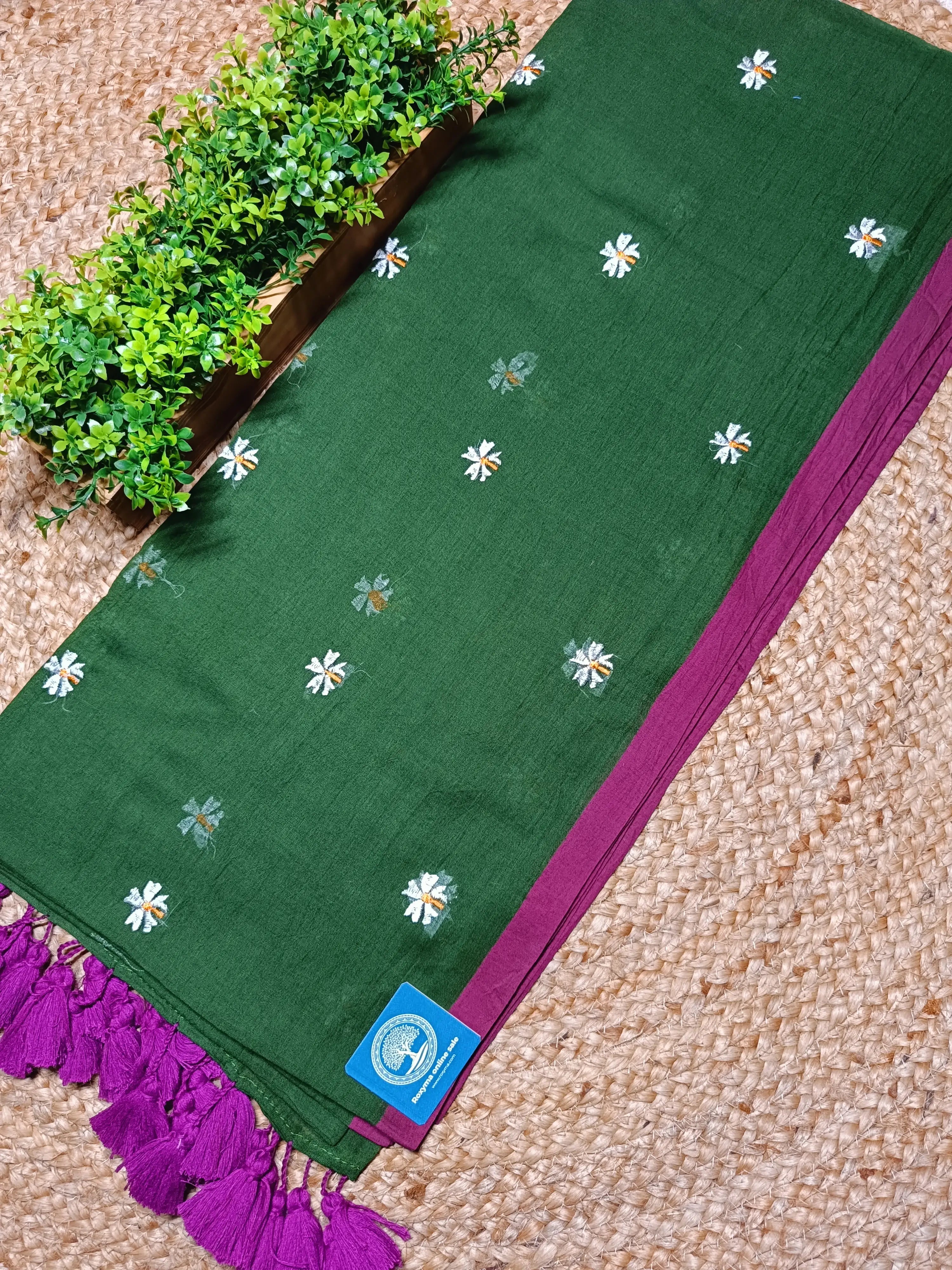 Pure Mulmul Cotton Saree with Seuli Flower Embroidery – Handcrafted Lightweight Bengal Cotton Saree in Forest Green with Contrast Border