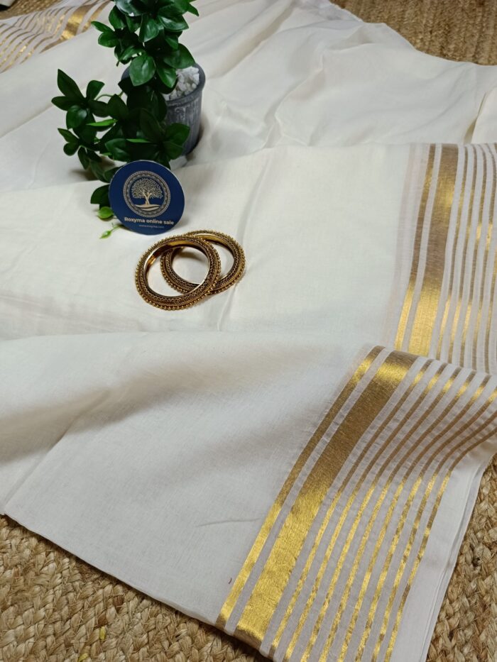 Bengal Mull Cotton Saree, Featuring A Striking Contrast Zari Border And Playful Pompom Edging - Image 2