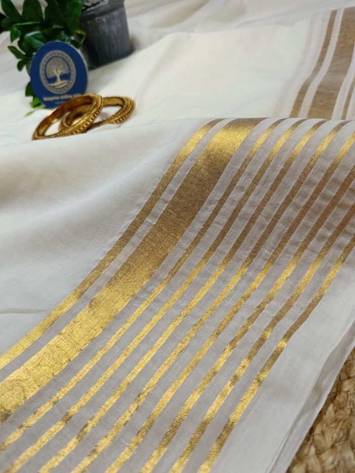 Bengal Mull Cotton Saree, Featuring A Striking Contrast Zari Border And Playful Pompom Edging - Image 3