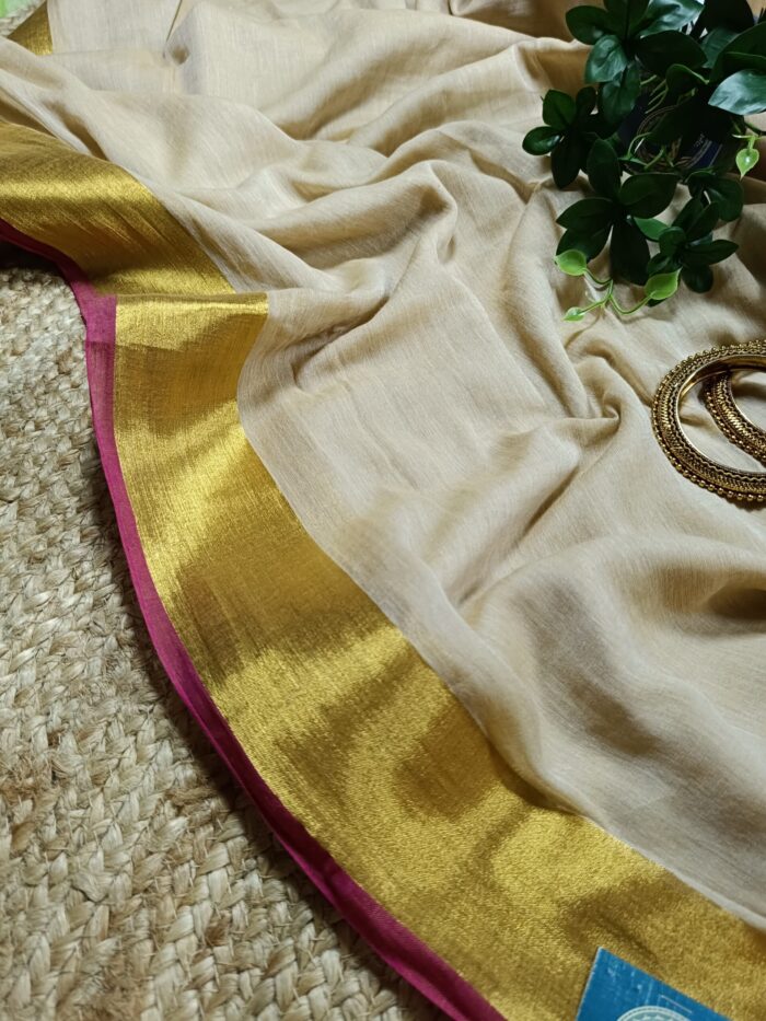 Bengal Mull Cotton Saree, Featuring A Striking Contrast Zari Border And Playful Pompom Edging - Image 3