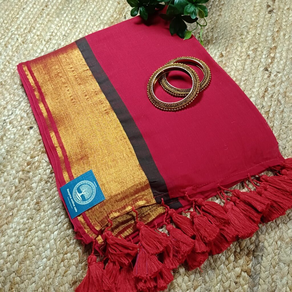 Bengal Mull Cotton Saree Featuring A Striking Contrast Zari Border And Playful Pompom Edging